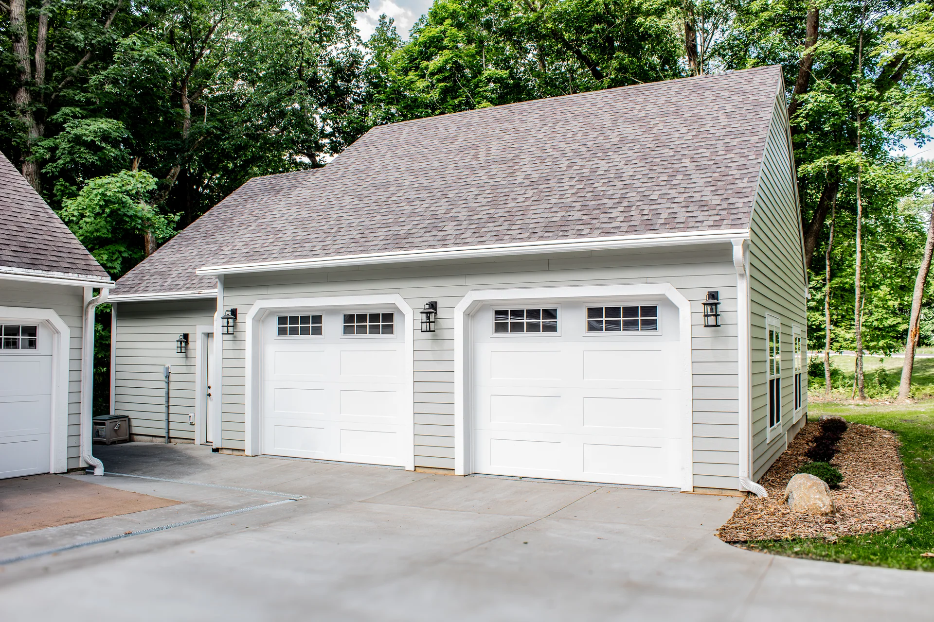 Front view of the detached two-door garage and shop