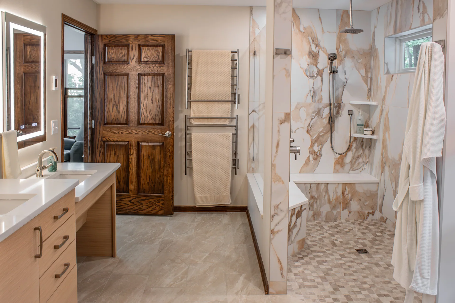 Primary bathroom with wood cabinetry and walk-in shower