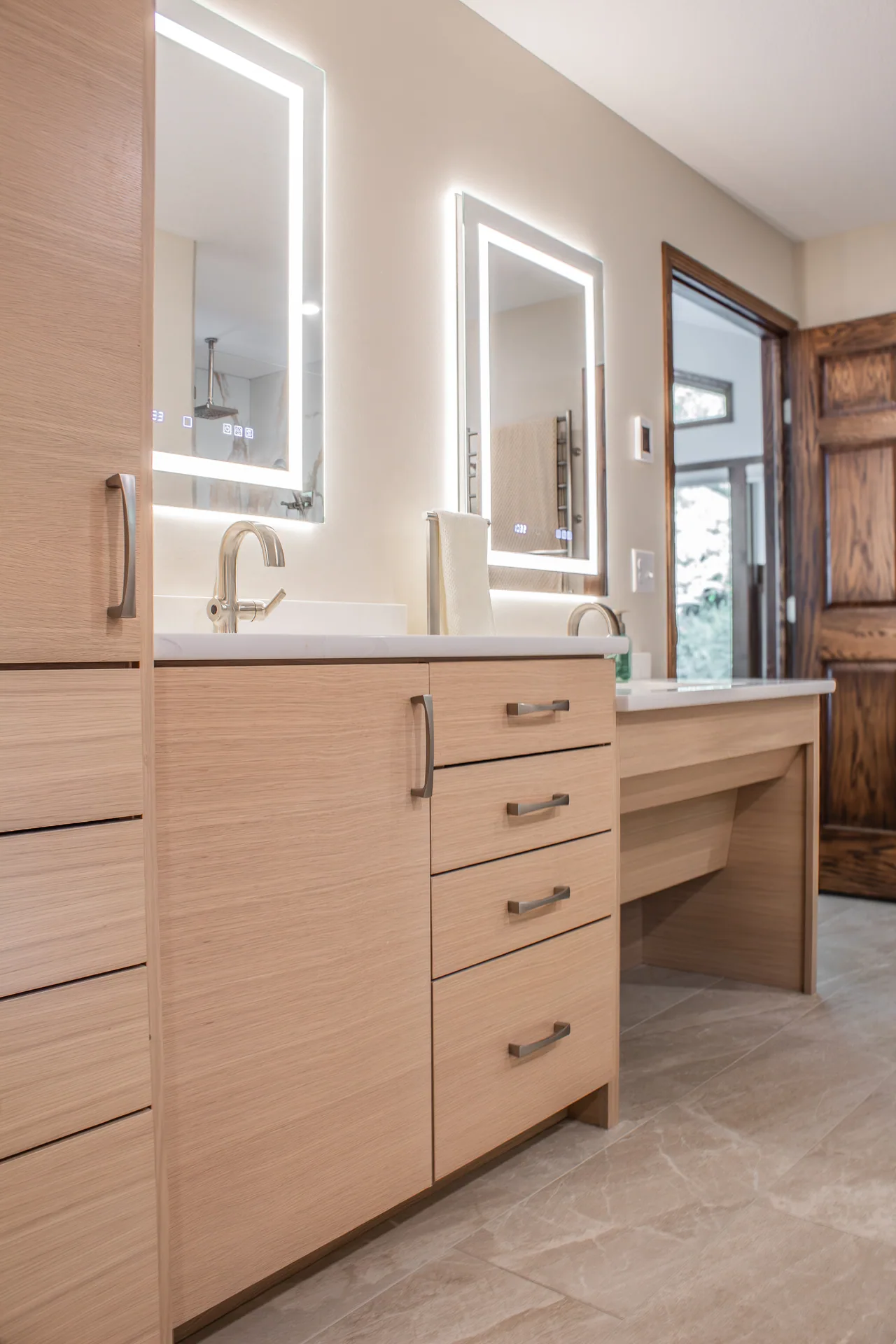 Wood bathroom vanity and seated counter area