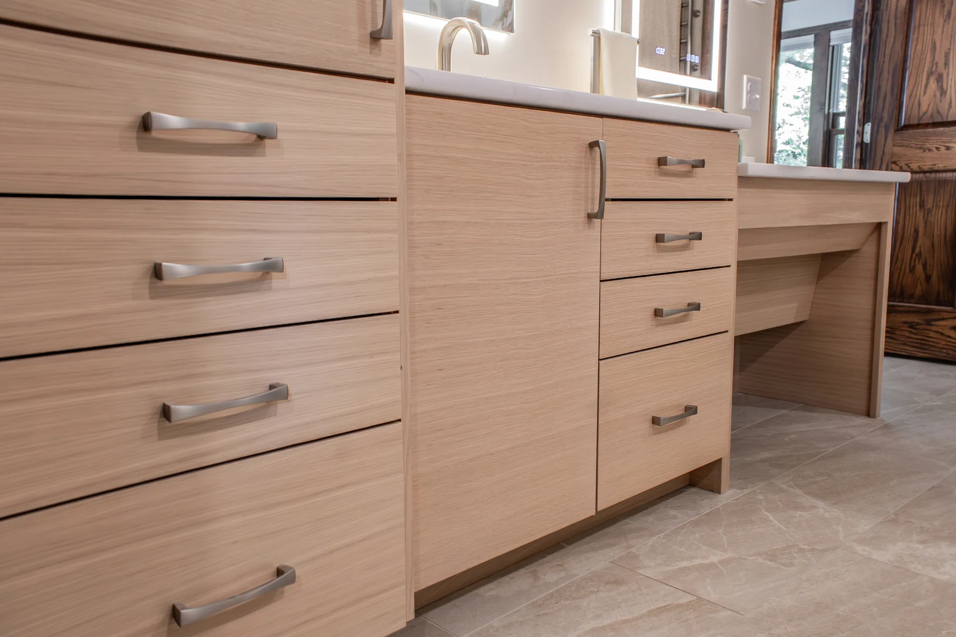 Bathroom drawers, cabinet doors, and hardware detail