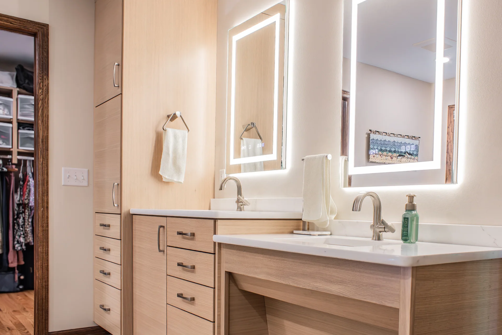 Vanity seating area and tall storage cabinet