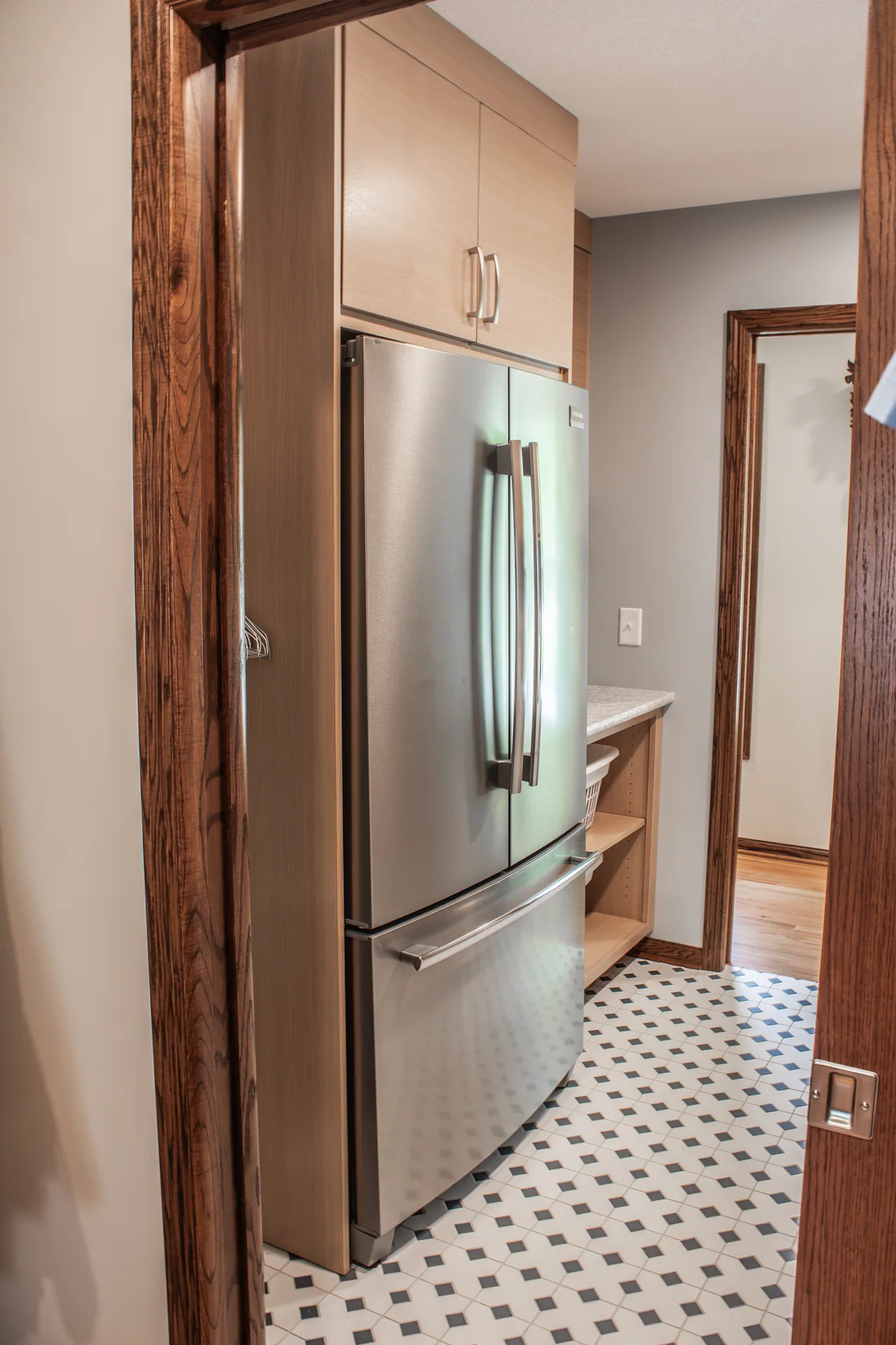 Laundry refrigerator and adjoining hallway